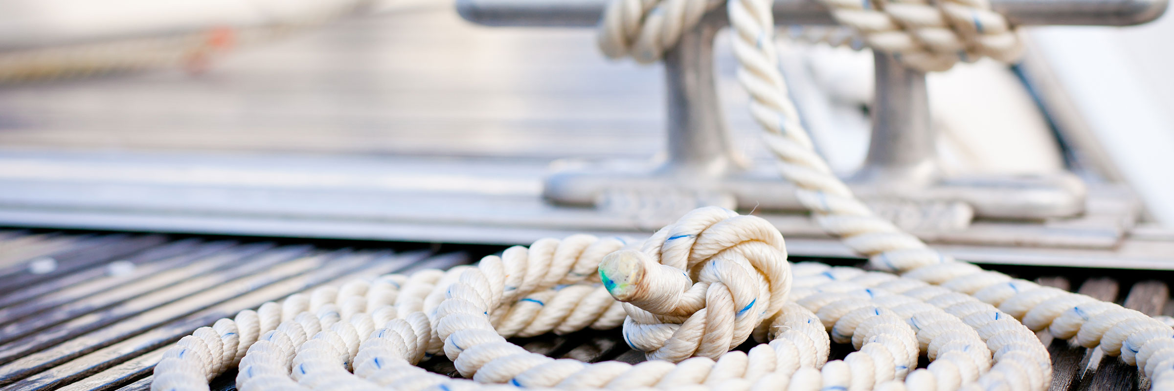 A closeup of a rope tied to the dock